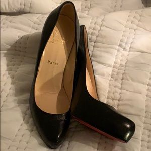 Christian Louboutins black heels